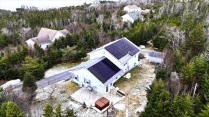 Rooftop array of JA Solar 440 W panels installed by Maritime Solar in Prospect, Nova Scotia.